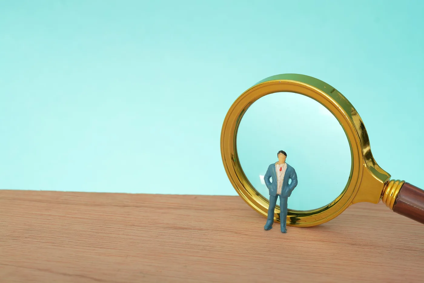 The businessman carefully examines the intricate details of his financial strategy